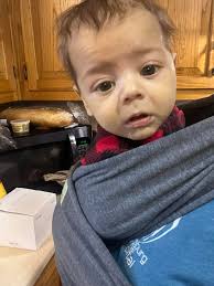 Why I'm Still Here… By Ashley Bayliss-White This photo is everything. It  was Christmas Eve. My son Andrew had just come out of the ICU after two  long weeks in the ICU.