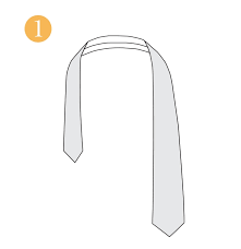 The half windsor knot provides a professional, sleek appearance. How To Tie A Tie Paul Fredrick