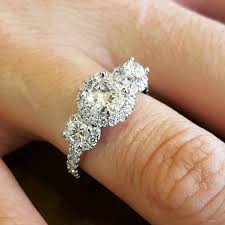 These 3 Stone Engagement Rings Have A Very Special Meaning Behind Them 3 Stone Engagement Rings Three Stone Engagement Rings Three Stone Engagement Rings Halo