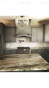 However, finding a flooring color that matches or complements the tones in the wood can often be a challenge. Gray Shaker Cabinet Brown Granite Countertops Gray Shaker Cabinets Fantasy Brown Granite