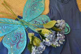 Find a pretty dress or a bodysuit and ballet tutu, the frillier the better. Maleficent Flittle Blue Fairy Costume Brie Brie Blooms