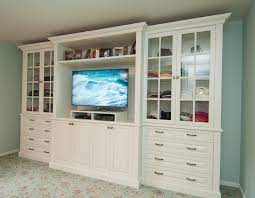 While the paint dries, drill three holes in the back of the dresser for the electronics cables. Tv Stand Dresser And Display Shelves Combination Creates Elegant Built In Style Efficiency And Storage Built In Tv Cabinet Bedroom Tv Stand Dresser Tv Stand