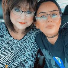 kitchen cabinets with dark green paint and gold handles?