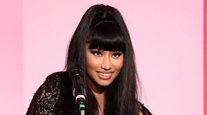 Where are the best nicki minaj hairstyles and photos. Nicki Minaj Debuts Two Tone Neon Hair Color See Photo Allure