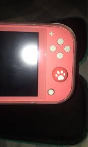 Skip to the end of the images gallery. 2 Month Old Nintendo Switch Lite Coral Set With Games And Case Video Gaming Video Game Consoles Nintendo On Carousell