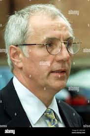 Trevor Hicks who lost two daughters in the Hillsborough disaster arrives at  Leeds Crown Court. The jury in the trial of two senior police officers  accused of the manslaughter of fans in