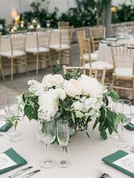 Low Lush Garden Style Centerpiece Of Foliage And White Blooms At A Wedding Reception At Phil Wedding Centerpieces Wedding Centerpieces Diy Diy Wedding Flowers