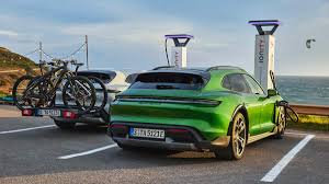 Porsche introduces a taycan station wagon, called cross turismo, for the 2021 model year. Porsche Taycan Cross Turismo Breaks Cover Flaunts Off Roading Prowess Times Of India