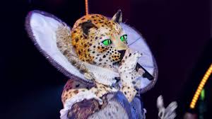 This masked singer wasn't always wanted, and a clue reel showed him being dropped off at doorstep as a baby. Who Is The Leopard On The Masked Singer Clues And The Voice Confuse Judges