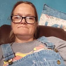 2 SEMI formal dresses Kate Spades size 4 purple knee length zipper back  TonyBowls size 0 black shoulder cut sleeve above belly shirt with black and  white and floral above knee flared