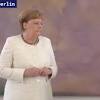 Story image for merkel shakes from Bloomberg