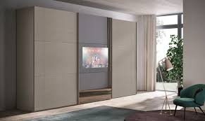 Parliamo dell'armadio con tv incorporata perfetto da inserire in un living che volge ad un'eleganza raffinata. Sipario Corso 11