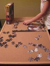 Unfortunately i couldn't find an instructables or other diy guide that allowed me to easily and cheaply make a height adjustable table. New Nostalgia Puzzle Table Jigsaw Puzzle Table Puzzle Storage