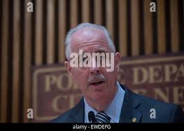 NYPD Chief of Detectives Robert Boyce displays suspect picture. NYC Mayor  Bill de Blasio joined NYPD commissioner James O'Neill, Brooklyn Borough  President Eric Adams & other officials in Brooklyn to announce that
