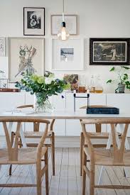 Simple Warm Scandinavian Dining Room Design With Perfect Replica Wishbone Chairs In Nat Scandinavian Dining Room Dining Room Inspiration Dining Room Lighting
