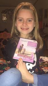 Had to share this photo of one of the stars of "Right Footed" Grace Day,  holding the "Right Footed" DVD. For those of you who don't know her story,  Grace was born