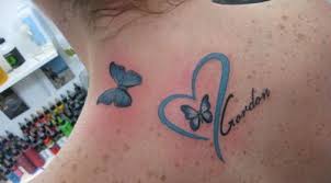 Pin By Kamisha Tucker On My Style Pink Ribbon Tattoos Butterfly Tattoo Ribbon Tattoos