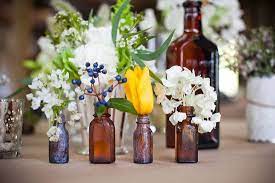 Wedding Planning From Wedding Dresses To Wedding Venues On Onewed Onewed Com Rustic Ranch Weddings Flowers In Jars Rustic Wedding Table