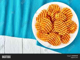 He leaned back in a colander to glass excess fluid. Crispy Potato Waffles Image Photo Free Trial Bigstock