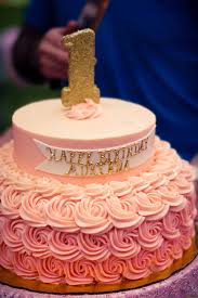 Pink Ombre Buttercream Rosette First Birthday Cake Top Tier Chocolate Cake With Cookies An First Birthday Cakes 1st Birthday Cakes First Birthday Cake Topper