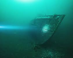 Deep Bay graveyard. While sunken boats like these are awesome for scuba  diving, this is the unfortunate ending for most of the derelict boats you  see floating around, and has become a