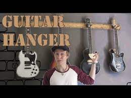 Helps to clear up floor space and keep your guitars within easy reach, and looking great. Guitar Hanger Build Youtube