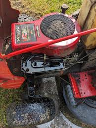 Lawn mower spitting fuel out air filter and stalling . : rlawnmowers