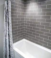 Dark blue bathroom wall tiles 2021. Top 50 Best Subway Tile Shower Ideas Bathroom Designs Tile Bathroom Grey Subway Tile Bathroom Subway Tiles Bathroom