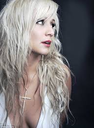 Gemma Louise Kirby is a singing mining truck driver who dropped 54 kilos