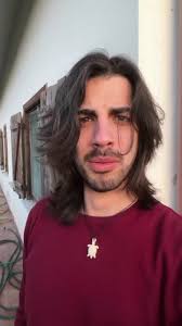 Guy and Dog Eating Salami Off The Floor