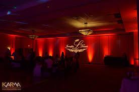 A rustic wedidng tablescape with a purple table runner, napkins and fall leaves. Beautiful Red And Purple Wedding Lighting At Arizona Golf Resort Mesa