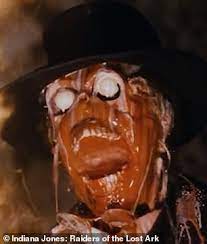 This candle depicts major arnold ernst toht, the guy who gets his face melted off, from steven spielberg's indiana jones: Snowflake Channel 4 Bosses Cut Key Nazi Face Melting Scene From Raiders Of The Lost Ark Daily Mail Online