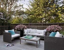 It shouldn't just be pretty—it should also be a fun place to be. 5 Chic Outdoor Decorating Ideas To Try This Spring Gray Patio Furniture Beautiful Outdoor Living Spaces Outdoor Living Space