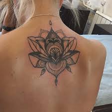 Black and grey lotus flowers tattoo on left half sleeve. 45 Pretty Lotus Flower Tattoo Ideas For Women Stayglam