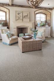 Neutral Carpeting By Karastan Bring Calm To This Coastal Living Room Buying Carpet Coastal Living Room Cosy Living Room