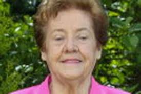 Hundreds of mourners packed the local churchyard