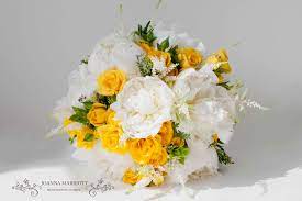 White And Yellow Bridal Bouquet Made Of Peonies Spray Roses Astilbe Accompanied By Garden Herbs Yellow Bridal Bouquets Wedding Themes Summer Bridal Flowers