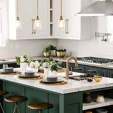 Modern Industrial Style Kitchen With Gold And Green Accents Green Kitchen Designs Interior Design Kitchen Small Contrasting Kitchen Island