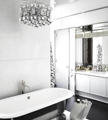 Add a bath bar over your vanity area for a look that's sleek and smooth. 5 Mid Century Modern Lighting Ideas That Will Change You