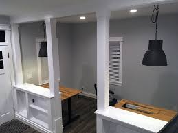 Sometimes you get bored of your open kitchen or decide to have a seperated diningroom or need a space to place your desk in your livingroom. Building A Half Wall To Divide Our Office From The Living Room Wall Molding Living Room Half Wall Room Divider Vaulted Ceiling Living Room