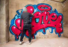 Type your name or a word in the text box above and click create graffiti. Graffiti Artist Spraying The Word Love On A Wall Stock Photo Picture And Royalty Free Image Image 133635040