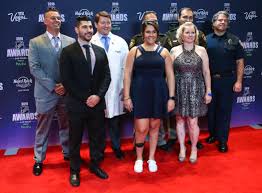 The nhl's finest busted out their best threads for the 2019 nhl awards presented by bridgestone on wednesday.many of the looks were custom made by a variety of suit makers with input from the players on design and color. Survivors And First Responders In The Oct 1 Shooting Including Unlv Hockey Assistant Coach Nick Robone Center Left Rylie Golgart Center And Lori Hosack Right Pose On The Red Carpet Ahead O