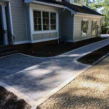 The sidewalks on both sides of my house are flagstone, as is the walkway through my front garden, and the patio and walkways extending from the deck in the backyard. Top 50 Best Paver Walkway Ideas Exterior Hardscape Designs