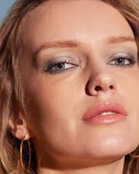 We're diving into the '90s archives with this shimmery retro blue eye &  soft pink lip. 💫 Shop the look today at Merle Norman Groves. Get the  #MermaidCore look: ✩ Sheer Face