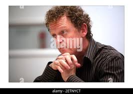 Q Radio.... Paul Rees (short hair, blue top) Editor of Q magazine and Rick  Blaxill (curly hair, brown top) Program Director Q radio.photograph by  David Sandison The Independent Stock Photo