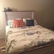 *side ro ller glides for smooth operating drawers. Willowton Queen Panel Bed Ashley Furniture Homestore