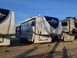 Your private bedroom offers a king bed. 2021 East To West Tandara 385mb Rv Dealer Rockford Il And Lake County Il Rvs For Sale Collier Rv