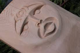 Sun and Moon feast dish Old growth red cedar Carved by me Beau Wagner