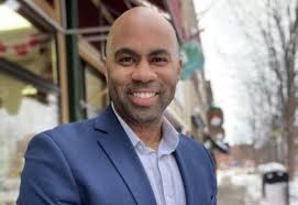 District 87 spokesperson and McLean County Board member Matthew Coates is  stepping down to serve