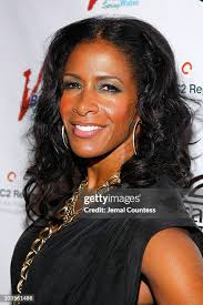 Tracey Finley and singer Melky Jean attend the 2nd Annual Geminis... News  Photo